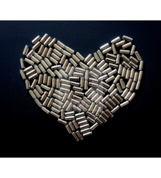 CORAZÓN CON BALAS DE FOGUEO